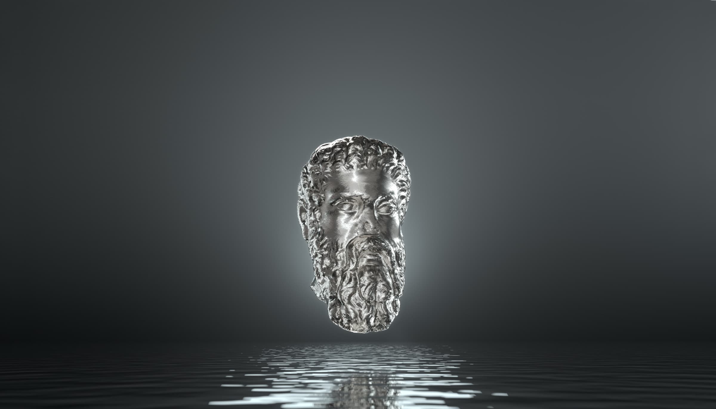 A bearded classical head cast in polished silver, floating above still water in grey light. Dimitri Daniloff
