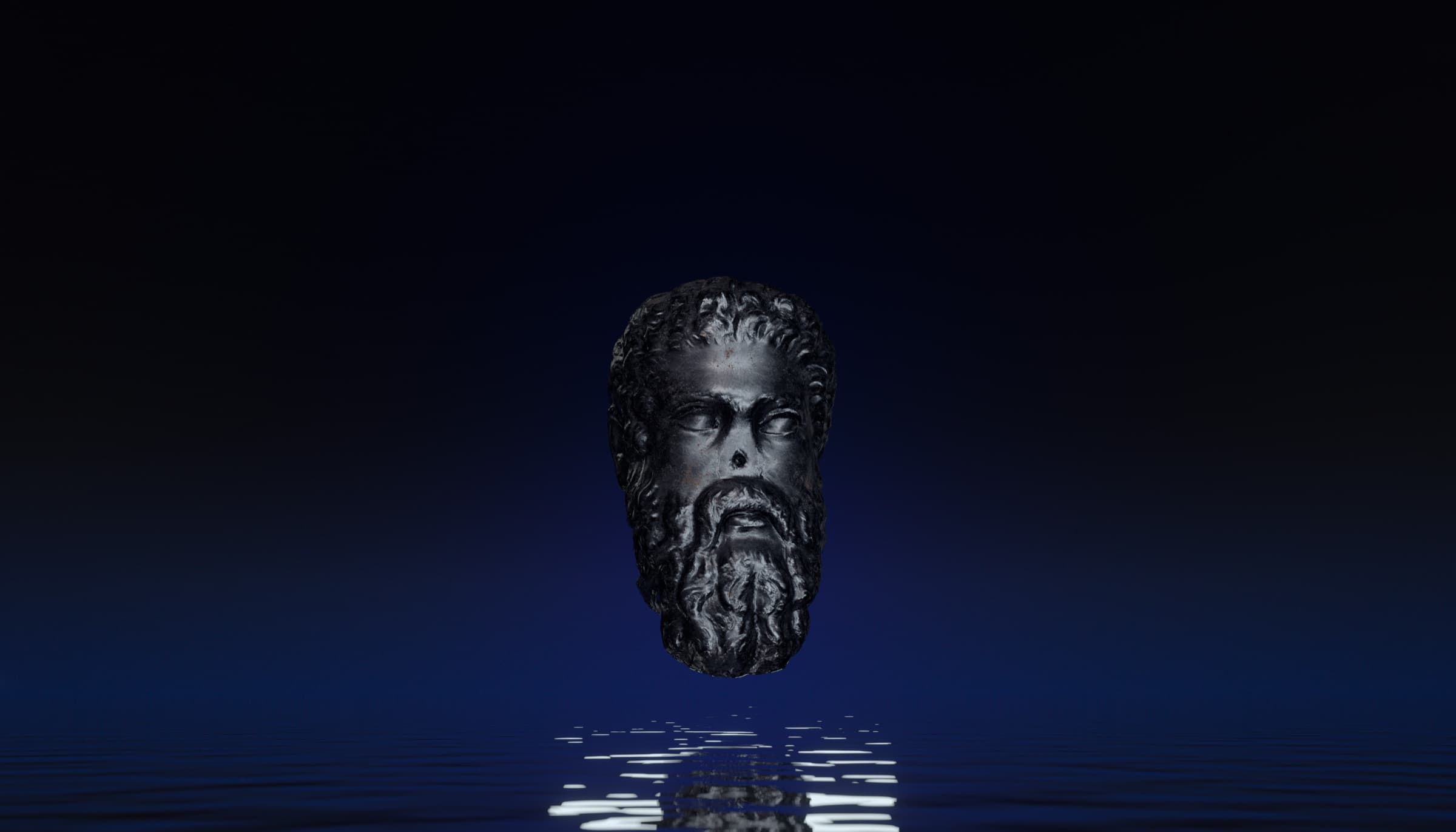 The same bearded head in dark patinated bronze above black water, lit deep blue. Dimitri Daniloff
